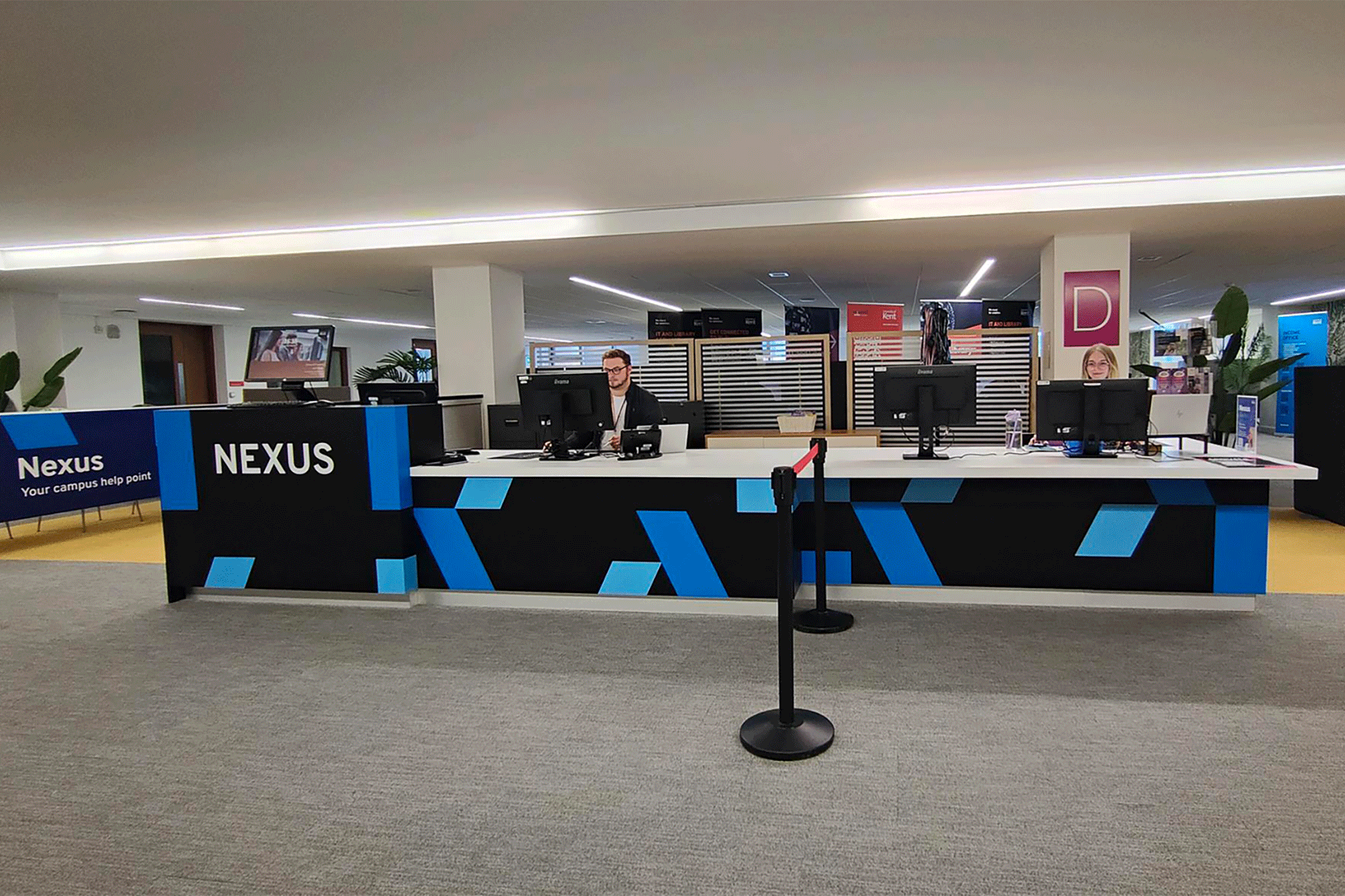 IT & Library support staff at the Nexus desk